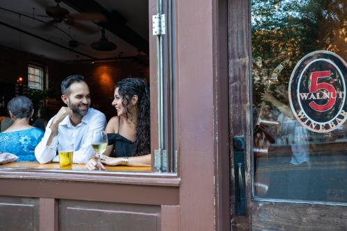 Enjoy a glass of wine at 5 Walnut Wine Bar in downtown Asheville, NC