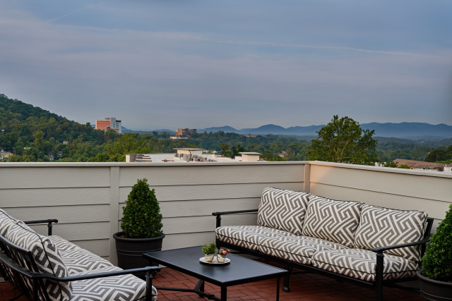 Relax on your own private terrace with mountain views in our 2 bedroom 1,500 sq. ft. Lookout Suite with a private elevator entrance