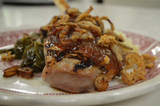 This delightful pork chop is one of several entrees on our nightly dinner menu. Try this topped with homemade bacon, homemade apple butter and crispy shallots.