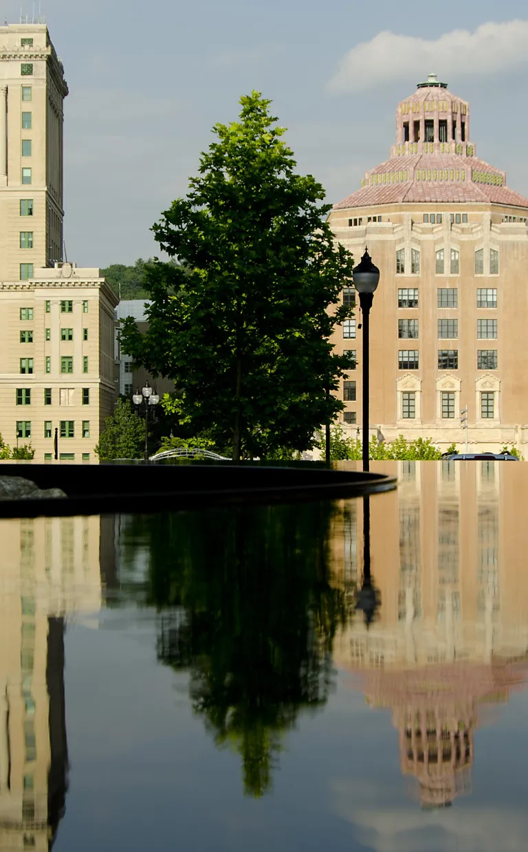 Beautiful Asheville architecture is reflected in a fountain