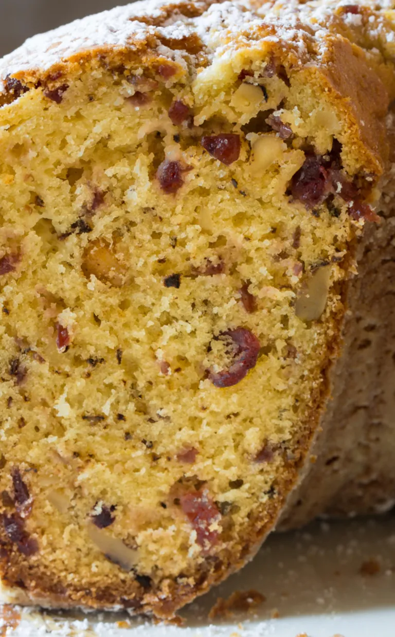A walnut cake with a slice removed